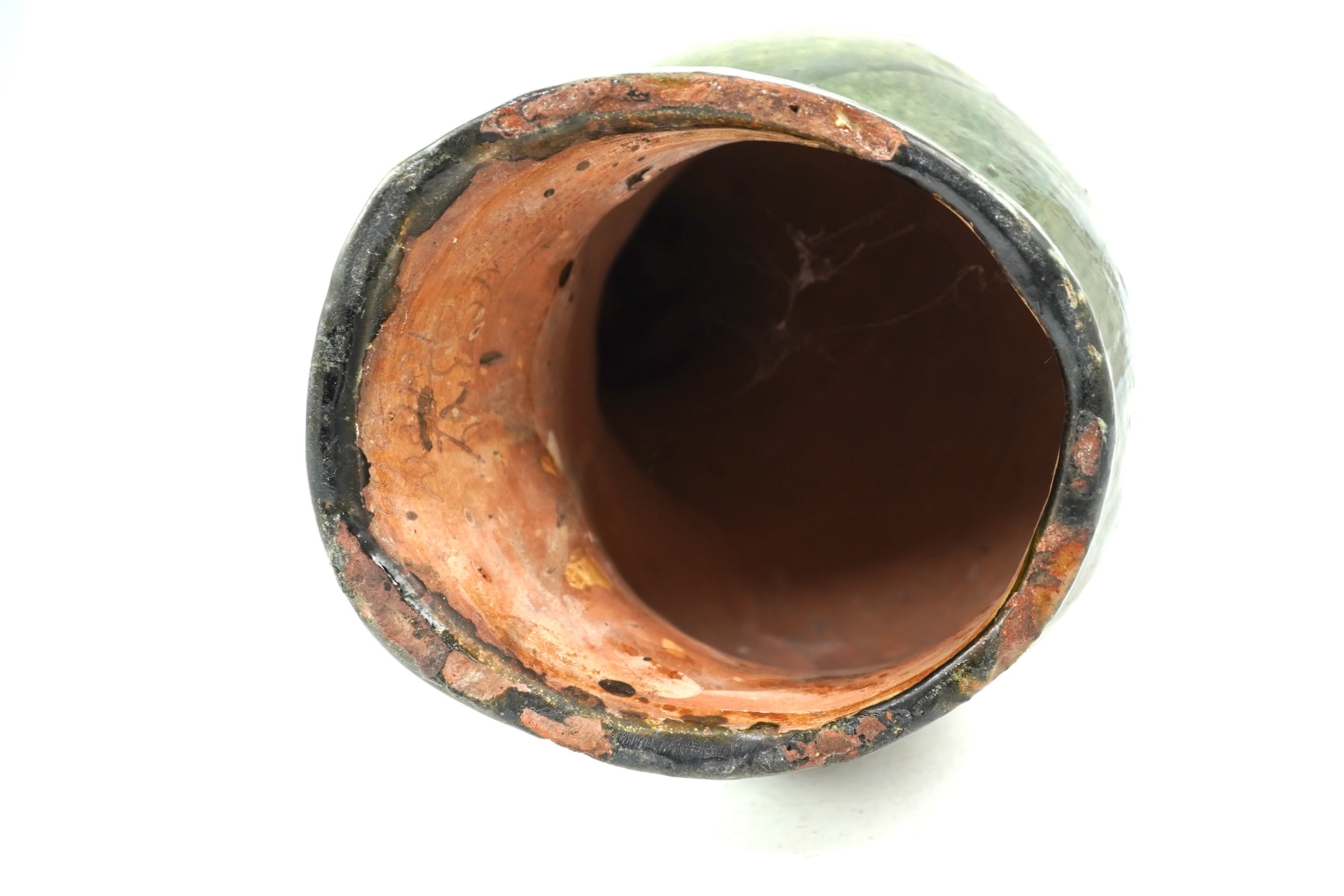 Ewenny Pottery: A large green-glazed figure of a seated cat